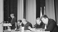 В президиуме собрания.