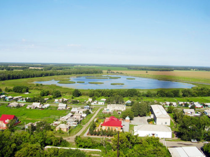 Вид с силосной башни элеватора на один из микрорайонов  села Половинного