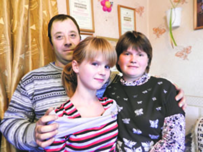 Владимир Бабенко с женой Юлией  и дочкой Яной. Фото Марины ЛУПЕЙКЕНЕ