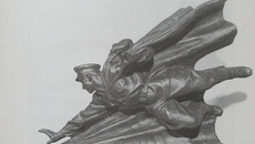 Памятник Якову Новиченко из гранита стоит в КНДР с 1987 года. Советский офицер изображен в прыжке за гранатой, поддерживают его листы огромной книги.