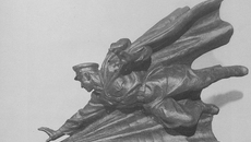 Памятник Якову Новиченко из гранита стоит в КНДР с 1987 года. Советский офицер изображен в прыжке за гранатой, поддерживают его листы огромной книги.